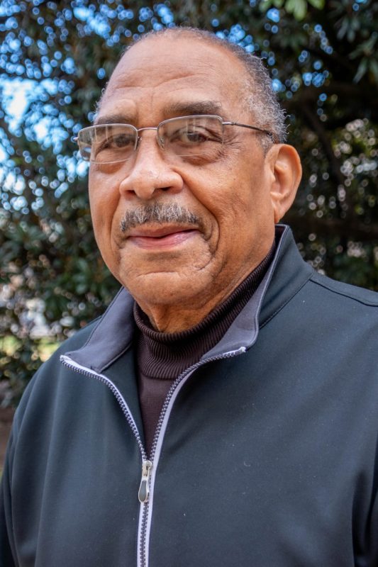 Dr. E. Wayne Harris poses for a photo outside.